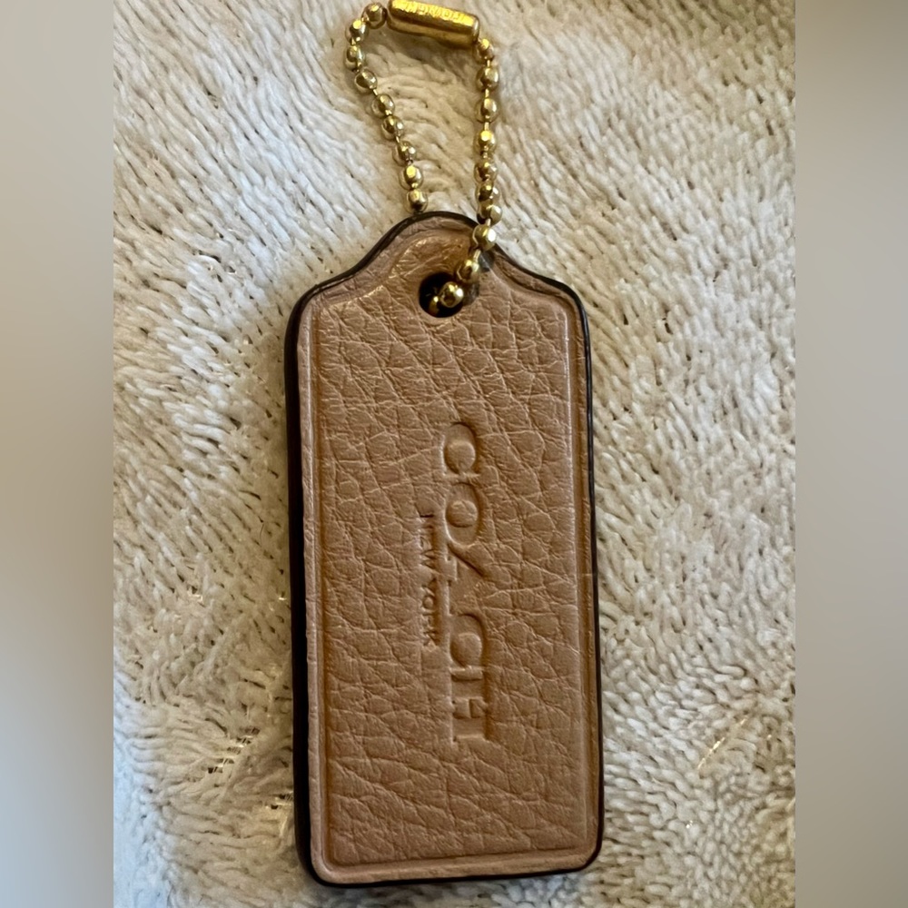 Coach-Leather Hang Tag- Cream- Good Used Condition.